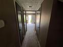 A hallway with doors leads to other rooms, offering easy access and a sense of flow throughout the home at 2572 Stratford Ln, Morrow, GA 30260