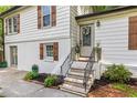 Inviting entrance with well-maintained landscaping and decorative details, offering great curb appeal at 4723 N Springs Nw Rd, Kennesaw, GA 30144