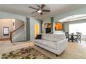 Bright living room with neutral tones, featuring a comfortable sofa, open layout, and seamless flow to the kitchen at 1945 Bay Beauty Ln # 10, Austell, GA 30106