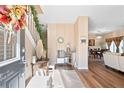 Inviting entryway with hardwood floors, decorative accents, and a glimpse into the dining and living areas at 988 Treymont Way, Lawrenceville, GA 30045