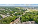 Aerial view of the community with mature trees, lush landscaping and close proximity to Buckhead at 2329 Marion Walk Se Dr # 5, Atlanta, GA 30339