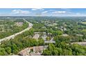 Community aerial view showcasing proximity to The Battery ATL and surrounding trees and landscape at 2329 Marion Walk Se Dr # 5, Atlanta, GA 30339
