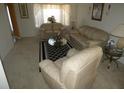 Inviting living room with neutral tones, comfortable seating, and ample natural light at 6179 Swabia Ln, Stone Mountain, GA 30087