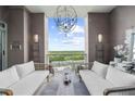 Relaxing outdoor space with white couches and views at 2881 Peachtree Ne Rd # 1102, Atlanta, GA 30305