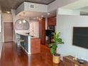 Contemporary kitchen with stainless steel appliances, granite countertops, and barstool seating at 860 Peachtree Ne St # 1411, Atlanta, GA 30308