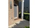 Welcoming front door with a gray finish and stylish address numbers at 5726 Silver Lake Dr, Mableton, GA 30126