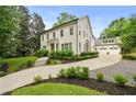 Elegant two-story home boasts manicured landscaping and a charming driveway at 4015 Wieuca Ne Rd, Atlanta, GA 30342