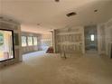 Open-concept living space with large windows and stair access at 101 Deer Canyon Dr, Auburn, GA 30011