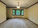 Spacious dining room with a bay window offering natural light and scenic views at 5307 Red Rock Trce, Powder Springs, GA 30127