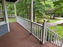 Enjoy the view from this covered porch at 5307 Red Rock Trce, Powder Springs, GA 30127