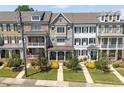 Attractive townhome community featuring diverse facades, manicured landscaping, and inviting walkways at 281 Cherokee Ne St, Marietta, GA 30060