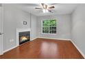 Cozy bedroom with hardwood floors, fireplace and bright window at 3655 Habersham Ne Rd # 244B, Atlanta, GA 30305