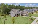 Beautiful home with manicured lawn and fountain at 438 Southland Cir, Canton, GA 30115