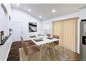 Cozy dining room with abundant light, a table for four, and easy access to the kitchen at 1241 Bethsaida Rd, Riverdale, GA 30296