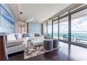 Bright living room features modern decor and large windows with stunning views at 3344 Peachtree Rd # 3505, Atlanta, GA 30326
