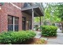 Brick condo building featuring well-maintained landscaping and a private balcony at 791 Wylie Se St # 807, Atlanta, GA 30316