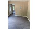 Home entryway featuring wood-look floors, neutral walls, and access to adjacent rooms at 615 Waynes Se Ct, Atlanta, GA 30354