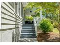 Inviting front porch featuring a comfortable seating area, providing a relaxing outdoor space to enjoy the serene surroundings at 1116 United Se Ave, Atlanta, GA 30316