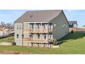New construction home with a two-story deck overlooking the backyard at 231 Laurel Vista Dr, Canton, GA 30114