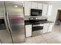 Modern kitchen equipped with stainless steel appliances and ample counter space at 50 Glenmore Dr, Kingston, GA 30145