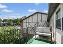 Private balcony with comfortable seating and views of the surrounding community at 6851 Roswell Rd # K-23, Atlanta, GA 30328