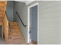 A close up of the unit's exterior door and staircase at 1102 Madison Ln # 1102, Smyrna, GA 30080
