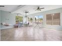 Large bonus room with multiple windows, tile flooring, and plenty of natural light at 5805 Fielding Ct, Cumming, GA 30041