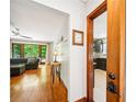 Inviting living room flows to kitchen and deck with nature views at 845 Stratford Rd, Avondale Estates, GA 30002