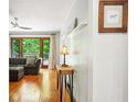 Bright living room with hardwood floors and access to outdoor deck at 845 Stratford Rd, Avondale Estates, GA 30002