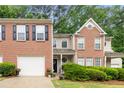 Charming brick home with manicured landscaping and a welcoming front entrance at 360 Parkview Manor Dr, Tucker, GA 30084