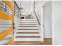 Inviting entryway with a staircase featuring white risers and wood treads, leading to the upper level at 1105 Sallete Ct, Marietta, GA 30066
