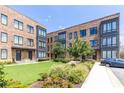 Beautiful townhome exterior featuring well-maintained landscaping and classic brick at 250 Castleberry Station Sw Dr, Atlanta, GA 30313