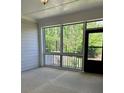 Enclosed porch featuring outdoor views at 3708 Cheswolde Ave, Powder Springs, GA 30127