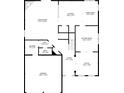 Detailed first floor plan showcasing the layout of the living spaces, kitchen, office, and garage at 4092 Duran Ln, Auburn, GA 30011