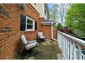 Cozy porch area with seating, ideal for relaxing outdoors at 8555 Hope Mews Ct, Sandy Springs, GA 30350