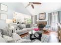 Cozy living room with a stone fireplace and comfortable seating at 1211 Fly Rod Ln, Loganville, GA 30052