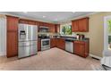 Well-equipped kitchen with stainless steel appliances and sleek countertops at 2279 Parkview Cir, College Park, GA 30337