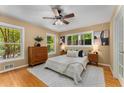 Cozy main bedroom with windows and hardwood flooring at 2279 Parkview Cir, College Park, GA 30337