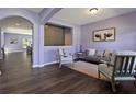 Comfortable living room featuring luxury vinyl plank flooring and soft, natural lighting at 211 Parc Dr, Canton, GA 30114