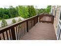 Spacious wooden deck perfect for entertaining and enjoying outdoor living at 2476 Suwanee Pointe Dr, Lawrenceville, GA 30043