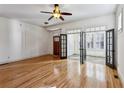 Spacious living room with hardwood floors, French doors, and natural light at 2765 Prado Ln, Marietta, GA 30066