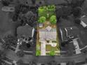 Bird's-eye view showcases a spacious property with a well-maintained home and lush greenery at 973 Buckhorn Bnd, Locust Grove, GA 30248