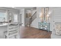 Open-concept design showcasing the seamless flow between the living, dining, and kitchen areas at 123 Ravencliff Dr # 80, Austell, GA 30168