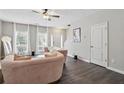 Inviting living room with large windows, modern decor, and hardwood floors at 20 Pine Canyon Sw Dr # 26, Atlanta, GA 30331