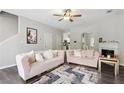 Stylish living room with modern furnishings, gray walls, and hardwood floors at 20 Pine Canyon Sw Dr # 26, Atlanta, GA 30331