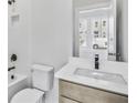 Well-lit bathroom features a modern vanity, white subway tile backsplash, and matte black fixtures at 2592 Alcovy Ne Trl, Marietta, GA 30066