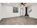 Spacious living room with modern flooring, fresh paint, and updated fixtures at 11 Peyton Place Sw, Atlanta, GA 30311