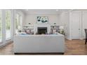 Bright living room with hardwood floors, fireplace, and neutral furnishings at 364 Glendale Ne Ave # B, Atlanta, GA 30307
