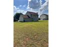Spacious backyard with potential for outdoor activities and entertaining at 5458 Stagecoach Rd, Ellenwood, GA 30294