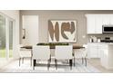 Modern dining room with a minimalist table setting, white chairs, and sleek decor at 616 Blue Sky Blvd, Acworth, GA 30102